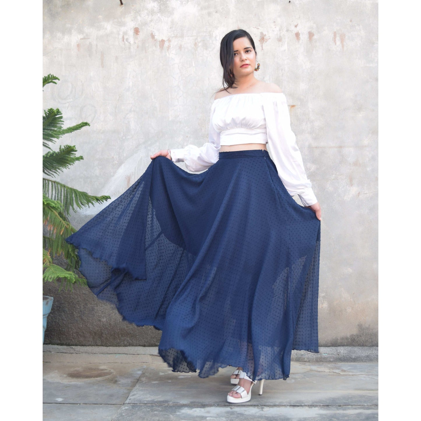 Product Description
Fabric -Chiffon
Pattern - Solid boota
Length - Maxi
Product details -
• Navy blue • Solid boota • Maxi skirt • A-line skirt • Partially Solid navy blue long flared skirt