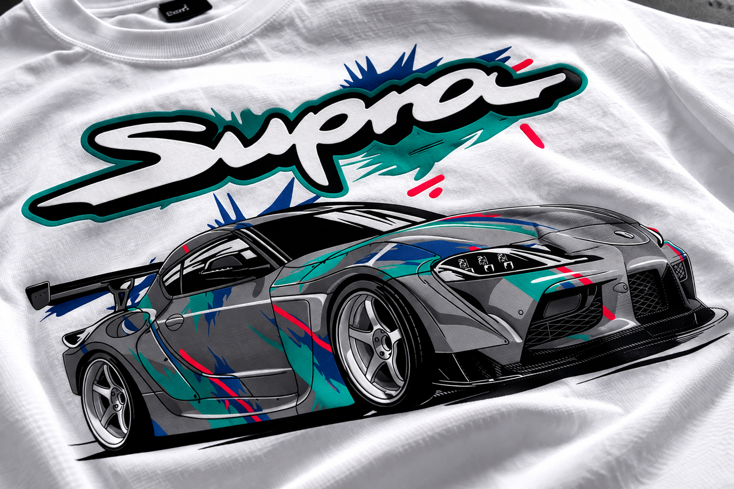 White t-shirt with a colorful car graphic and 'Supra' text on a white background