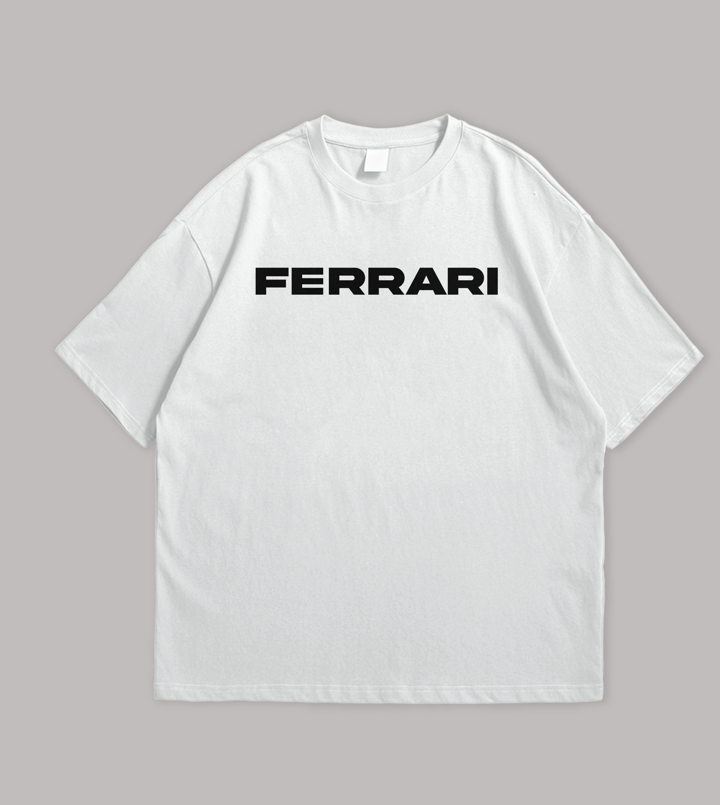 White t-shirt with 'Ferrari' logo on a gray background