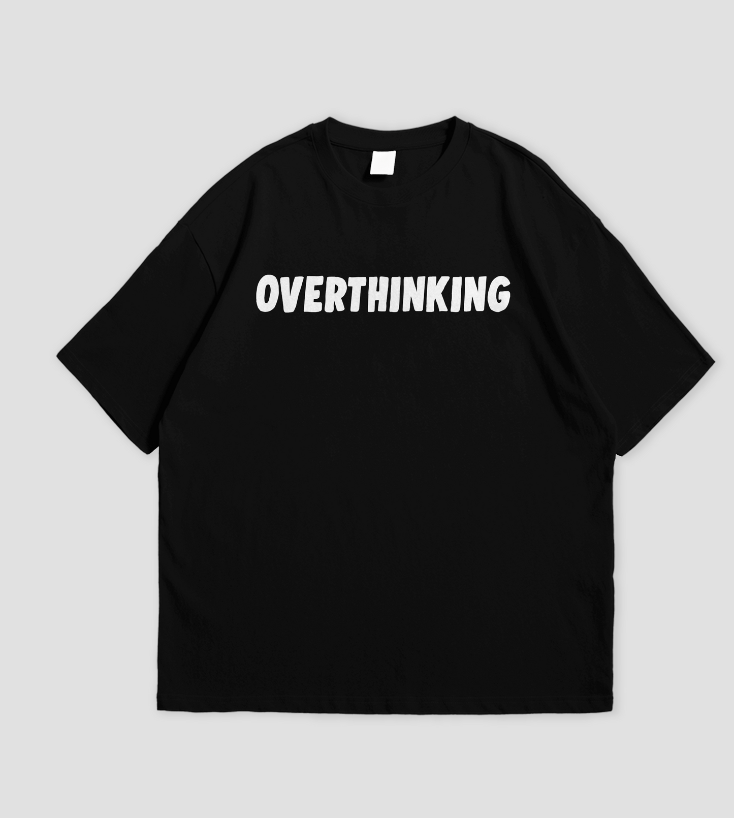 Black t-shirt with OVERTHINKING printed on a gray background